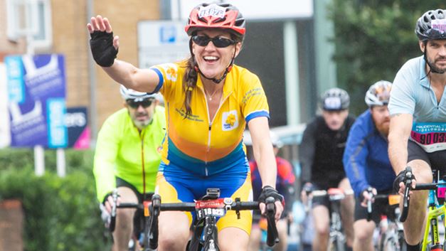 A woman running for Marie Curie