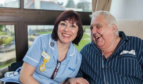 Marie Curie Nurse Jan with one of her patients in a hospice.