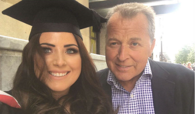 Jet and her dad attending her graduation