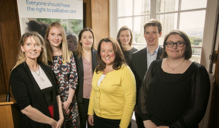 Staff from Marie Curie and Everyday Harmony pose with other conference attendees
