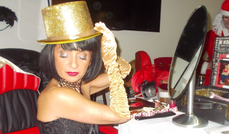 Lorrainne preparing for another burlesque performance.