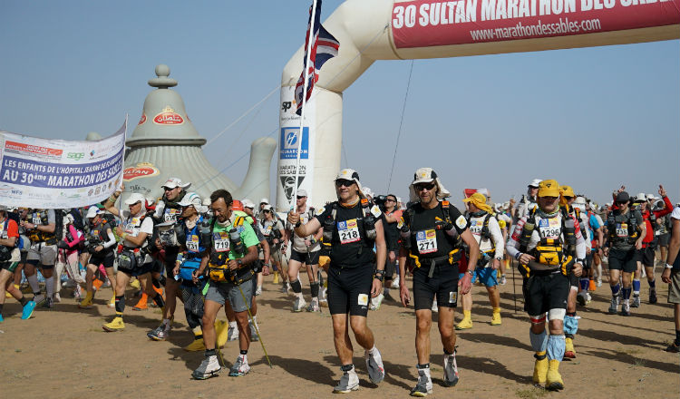 Sir Ranulph Fiennes leaving the start line on the third day of the Marathon des Sables -®LizScarffFieldcraftStudios
