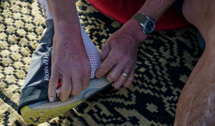 Sir Ranulph Fiennes preparing his desert trainers for the 91.7K long stage of the Marathon des Sables
