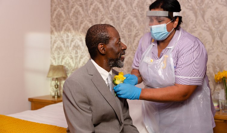 Nurse Bindi supporting a patient at home
