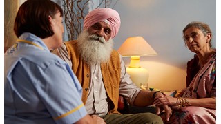 husband and wife with Marie Curie Nurse