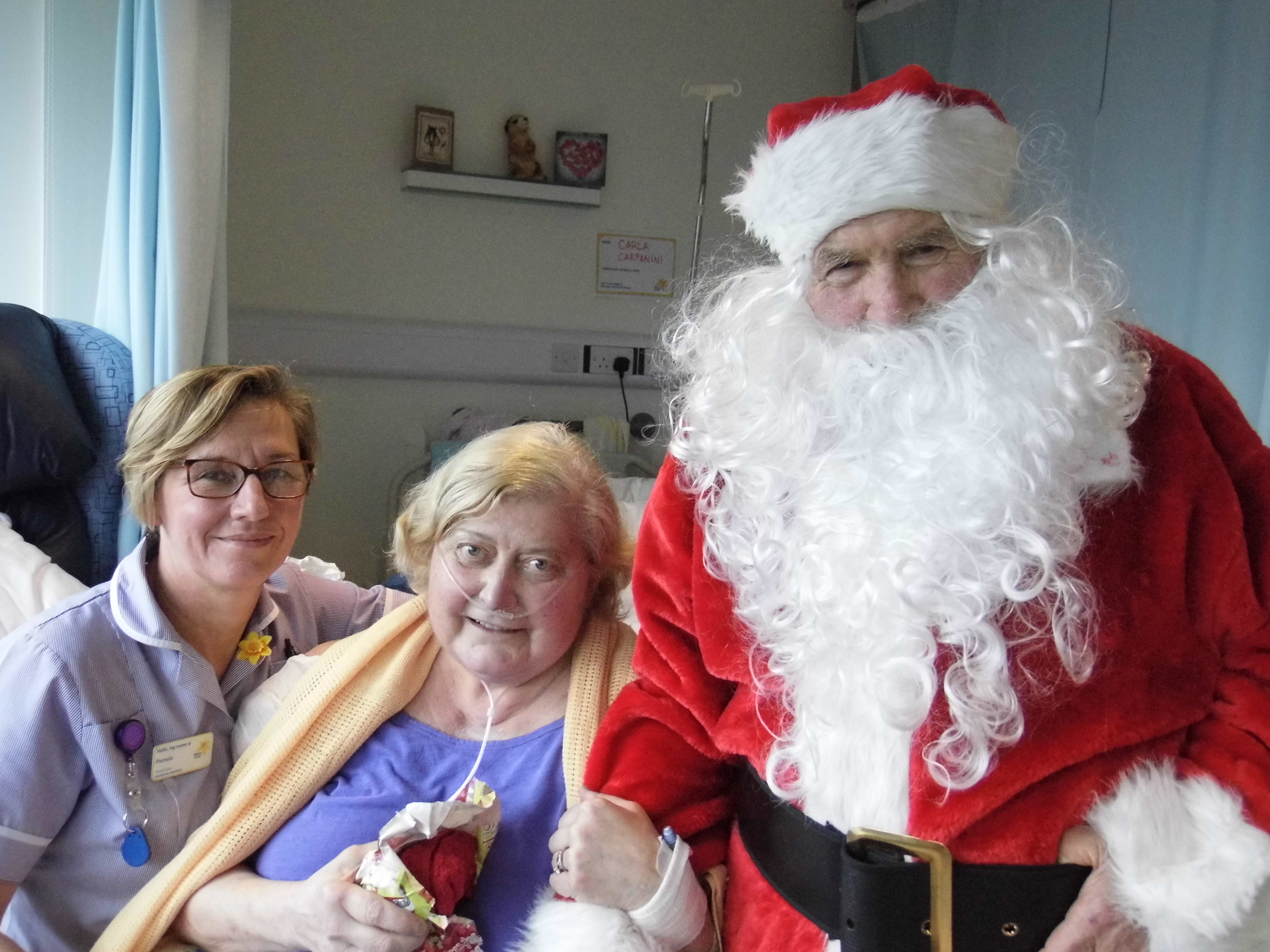 Carla Carpanini with Father Christmas at the Cardiff and the Vale Hospice