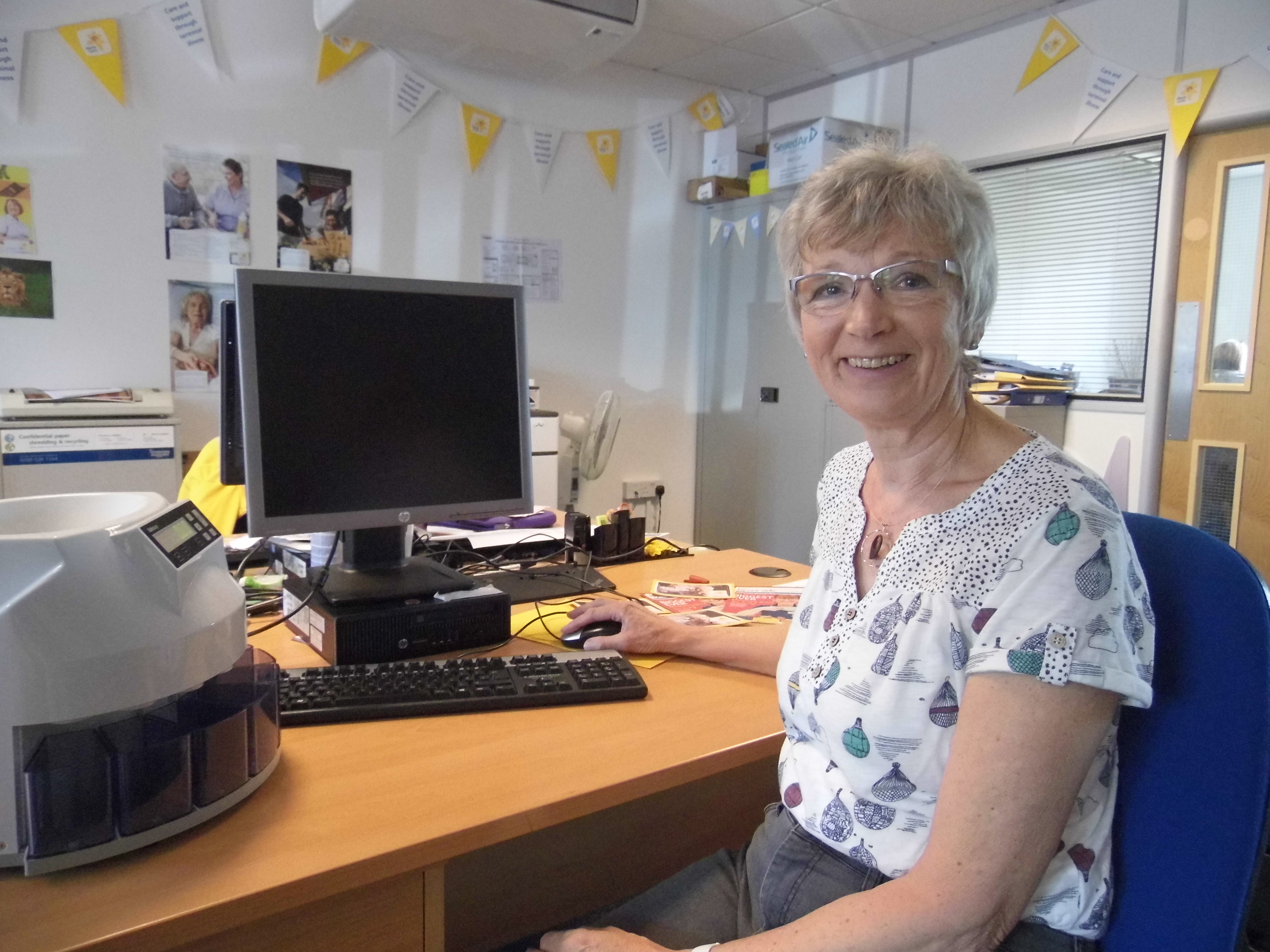Office volunteer uses working life skills to help charity