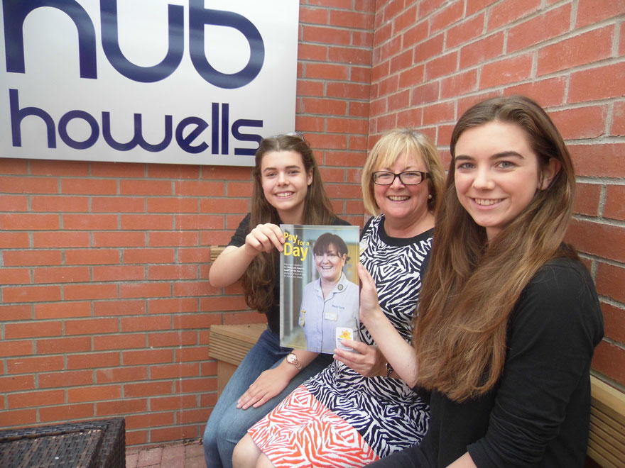 Hospice manager Paula Elson with Howell's pupils and Rotary Interact presidents Catrin Beynon and Eleanor Flood-Page 