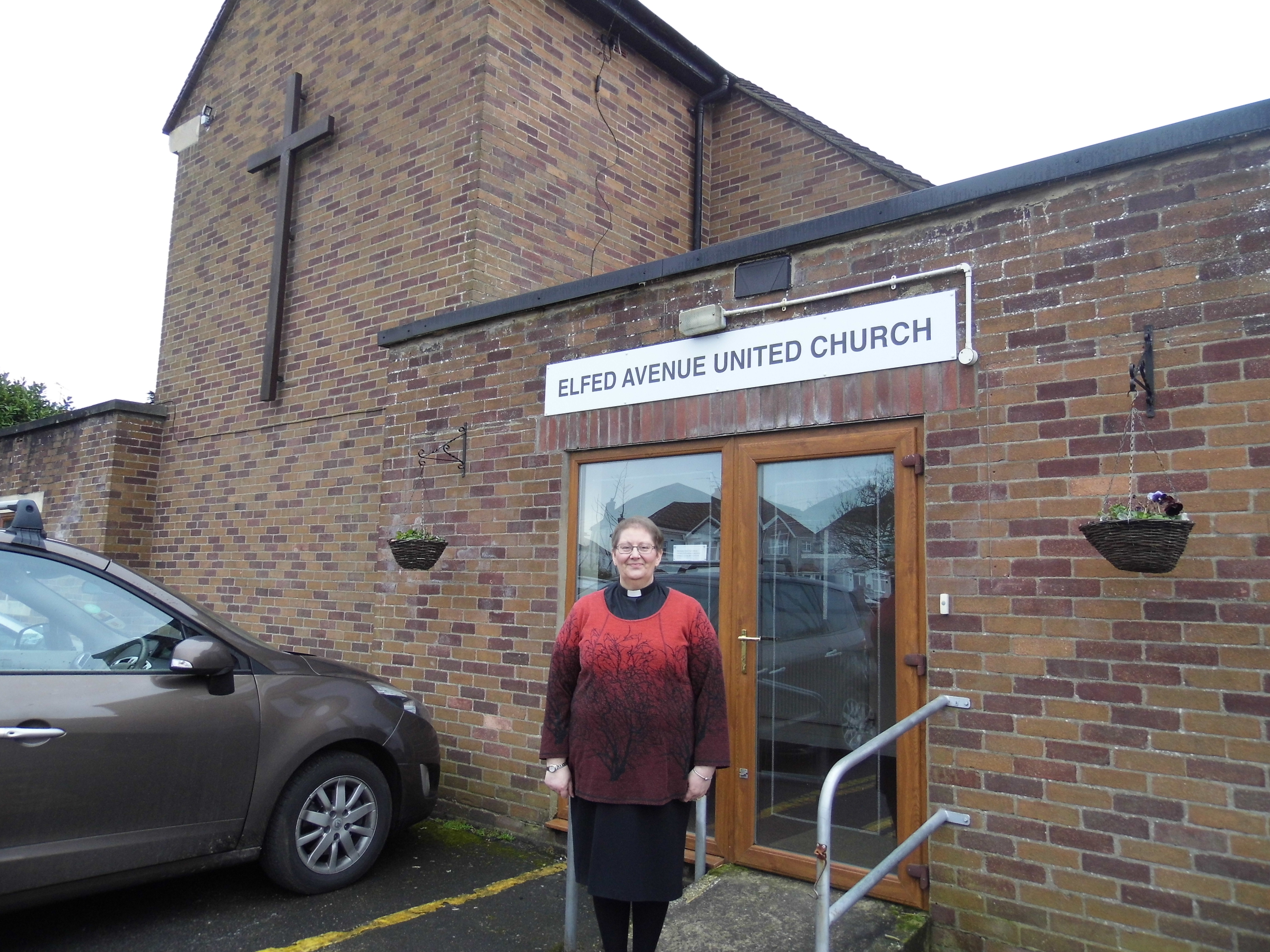 Sue Fender outside her church